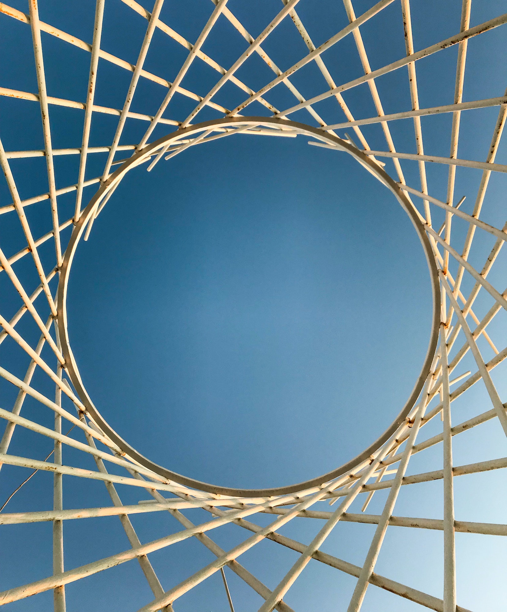 circle-from-a-grid-on-a-background-of-the-sky-abstraction.jpg